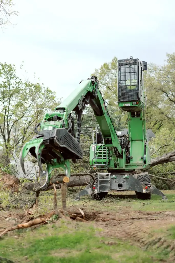 Tornado damage tree removal using heavy equipment in Oakland County, MI